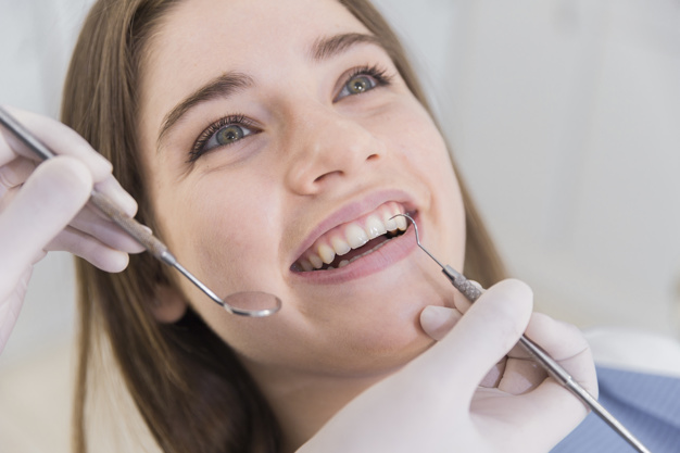 free dental consultation in abu dhabi , vision dental clinic
